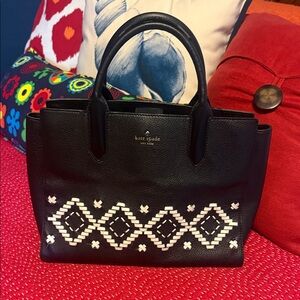 kate spade black leather satchel with white Aztec pattern